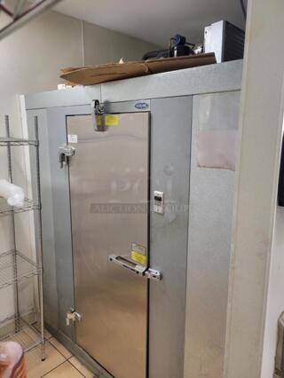 Norlake SELF CONTAINED 6'x6'x6' Walk-In Freezer with Floor. 208-230, 1 Phase. Pictures Show Unit In Place Before Removal.