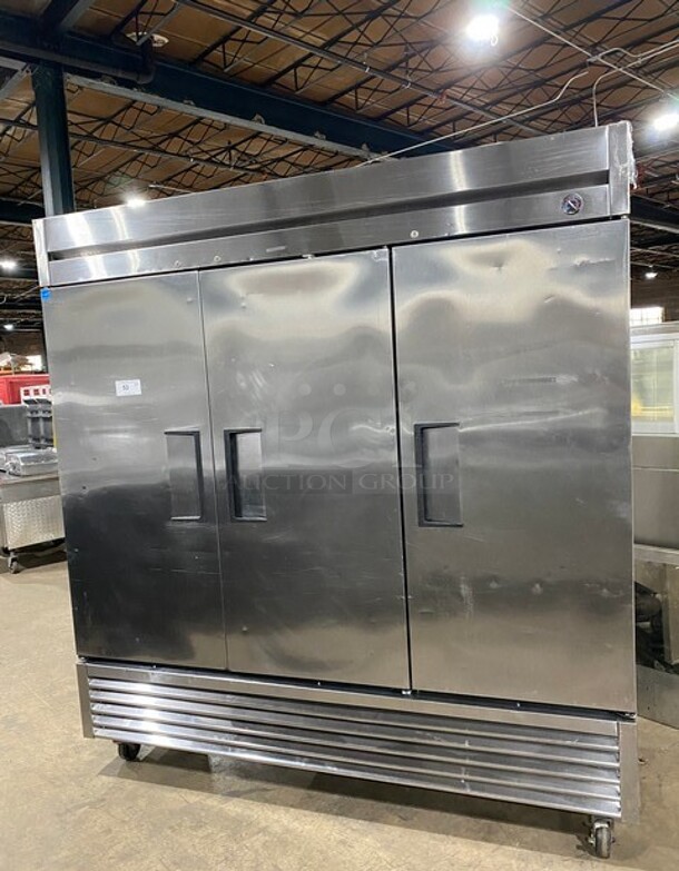 NICE! True Commercial 3 Door Reach In Freezer! With Poly Coated Racks! All Stainless Steel! On Casters! Model: T72F SN: 7633066 115V 1PH