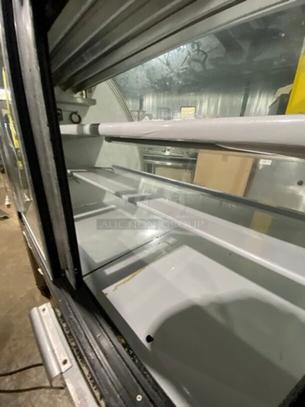 2010 Leader Commercial Refrigerated Bakery Display Case Merchandiser! With Curved Front Glass! With Rear Access Doors! Stainless Steel Body! Model: RHDL48 SN: PT10M1682D 115V 60HZ 1 Phase - Image 6 of 8
