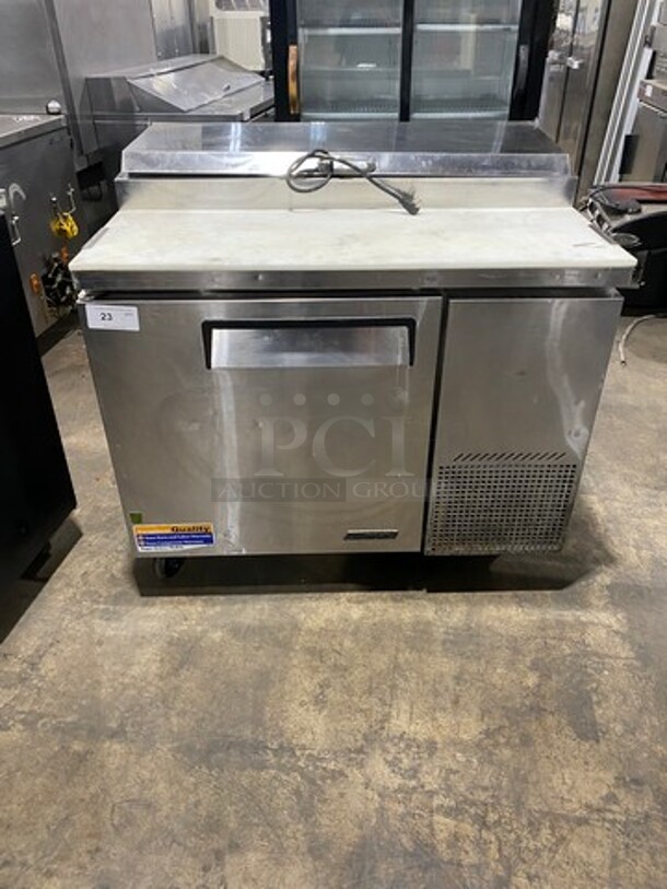 Nice! Turbo Air Commercial Refrigerated Pizza Prep Table! With Commercial Cutting Board! With Single Door Storage Space! Poly Coated Rack! All Stainless Steel! On Casters! Model: TPR44SD SN: TP4RA0100B 115V 60HZ 1 Phase! Working When Removed! 