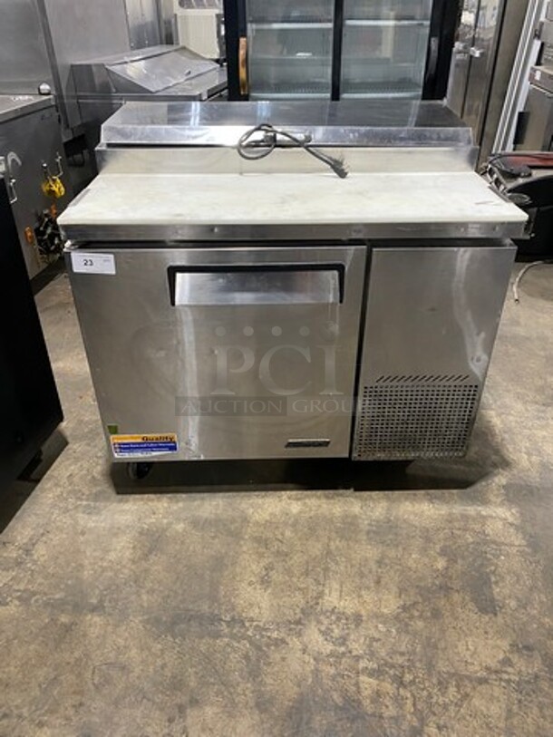 Nice! Turbo Air Commercial Refrigerated Pizza Prep Table! With Commercial Cutting Board! With Single Door Storage Space! Poly Coated Rack! All Stainless Steel! On Casters! Model: TPR44SD SN: TP4RA0100B 115V 60HZ 1 Phase! Working When Removed!  - Image 1 of 10