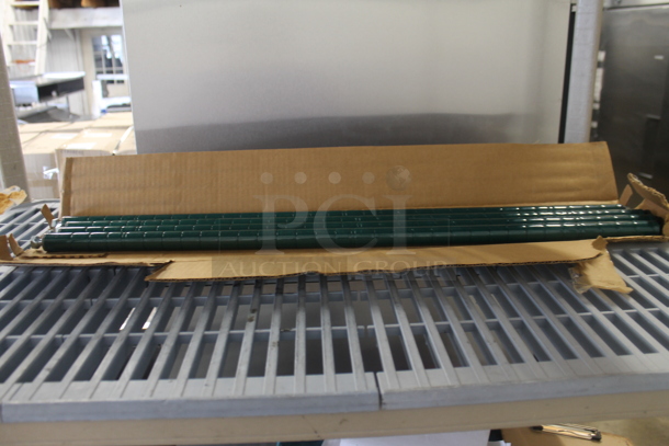 BRAND NEW IN BOX! 4 Green Finish Poles - Image 1 of 3