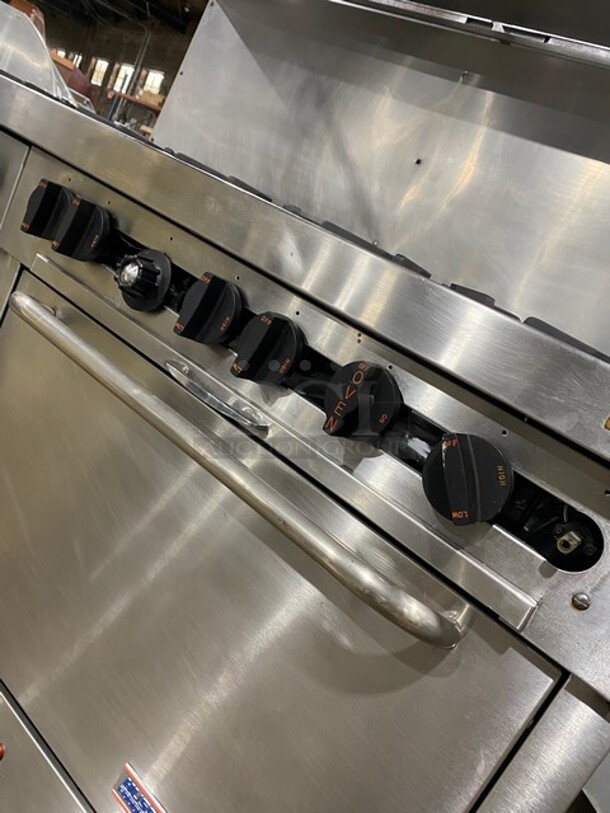 Southbend Commercial Natural Gas Powered 12 Burner Stove! With Raised Back Splash And Salamander Shelf! With 2 Full Size Oven Underneath! All Stainless Steel! On Casters! Working When Removed! - Image 9 of 10