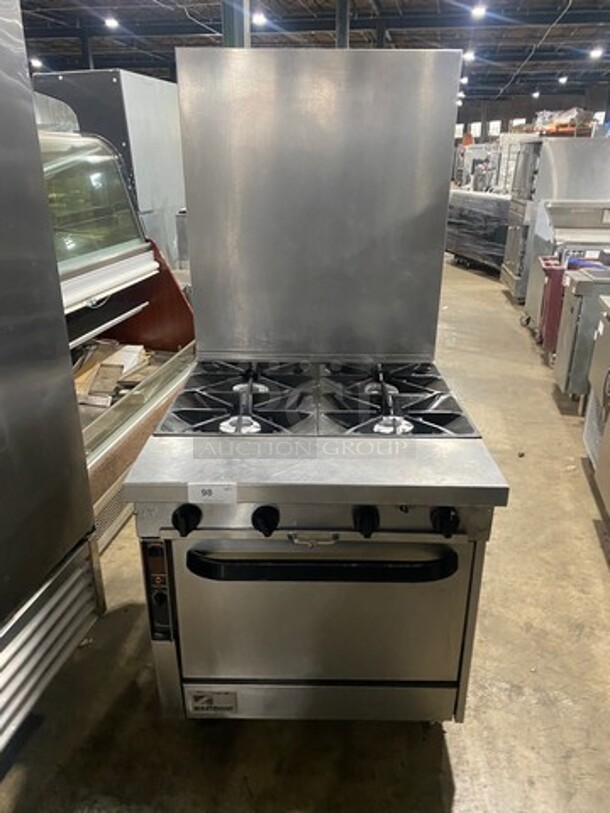 Southbend Commercial Natural Gas Powered 4 Burner Stove! With Raised Back Splash! With Oven Underneath! All Stainless Steel! On Casters! - Image 1 of 9