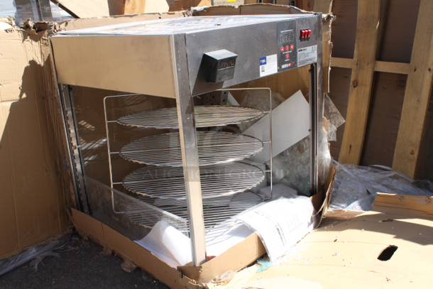 BRAND NEW SCRATCH & DENT! ServIt PDW18D1 18" Full-Service Pizza Warmer with 4-Shelf Rotating Rack 23-1/2x25-1/4x27-1/2. S/N: 1441411300231 Unit is dented and glass is broken.  - Image 3 of 5