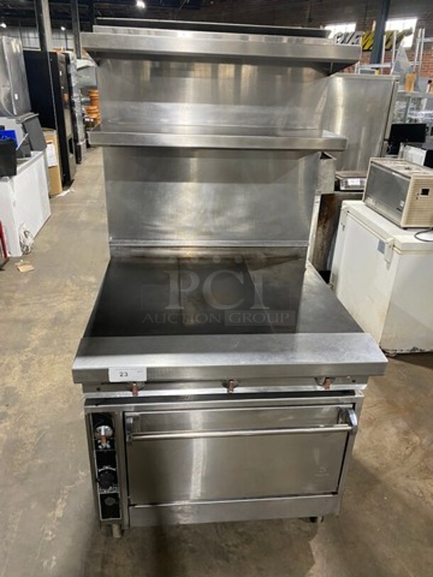 Jade Range Commercial Natural Gas Powered French Top/Hot Plate Stove! With Full Size Oven Underneath! With Metal Oven Racks! With Backsplash And Double Overhead Shelves! All Stainless Steel! On Casters! - Image 1 of 9