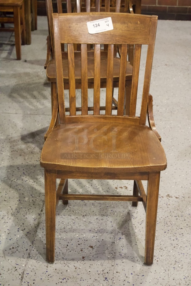 BEAUTIFUL! Set Of 4 Solid Wood Vertical Ladder Back Chairs. 18x13x35  
4x Your Bid.                      
some chairs are darker than others.