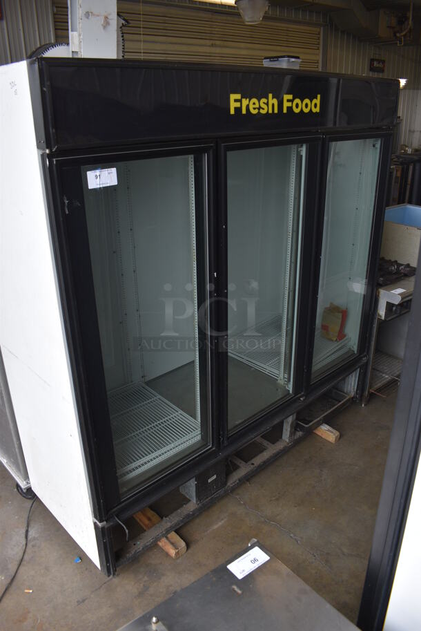 True Model GDM-72 Metal Commercial 3 Glass Door Reach In Cooler Merchandiser w/ Poly Coated Racks. 115 Volts, 1 Phase. 78x30x77. Tested and Working!