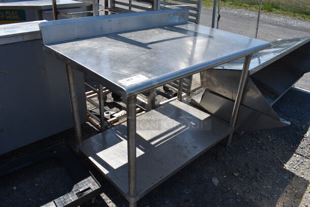 Stainless Steel Commercial Table w/ Back Splash and Metal Under Shelf. 48x30x40.5