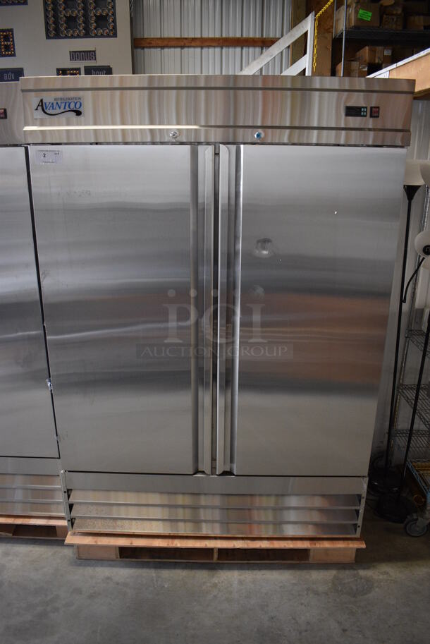 BRAND NEW SCRATCH AND DENT! Avantco Model 178SS2FHC Stainless Steel Commercial Two Door Reach In Freezer w/ Poly Coated Racks on Commercial Casters. 115 Volts, 1 Phase. 54x32x77.5. Tested and Working!