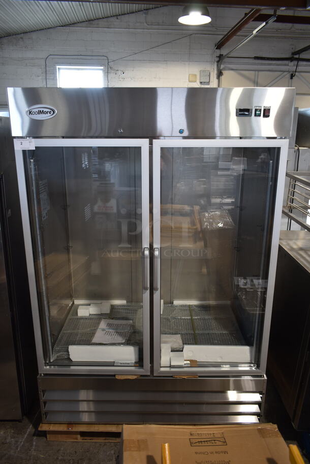 BRAND NEW SCRATCH AND DENT! 2023 KoolMore RIR-2D-GD Stainless Steel 2 Door Reach In Cooler Merchandiser w/ Poly Coated Racks. 115 Volts, 1 Phase. Tested and Working!