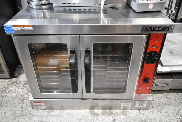 BRAND NEW SCRATCH AND DENT! Vulcan VC4ED ENERGY STAR Stainless Steel Commercial Electric Powered Full Size Convection Oven w/ View Through Doors, Metal Oven Racks and Thermostatic Controls. 480 Volts, 3/1 Phase. No Legs.  - Image 2 of 5