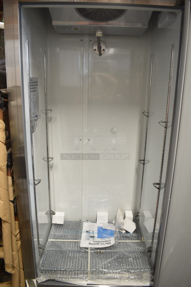 BRAND NEW SCRATCH AND DENT! 2024 Avantco 178A19FHC Stainless Steel Commercial Single Door Reach In Freezer w/ Poly Coated Racks on Commercial Casters. 115 Volts, 1 Phase. Tested and Working! - Image 6 of 7