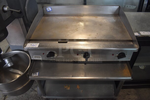 Toastmaster Pro Series Stainless Steel Commercial Countertop Electric Powered Flat Top Griddle w/ Thermostatic Controls and Stainless Steel Commercial Equipment Stand w/ Under Shelf. 208-240 Volts, 3 Phase. 36x26x16, 36x30x25