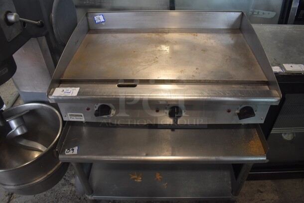 Toastmaster Pro Series Stainless Steel Commercial Countertop Electric Powered Flat Top Griddle w/ Thermostatic Controls and Stainless Steel Commercial Equipment Stand w/ Under Shelf. 208-240 Volts, 3 Phase. 36x26x16, 36x30x25 - Image 1 of 8