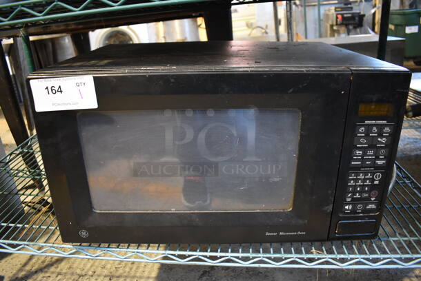 General Electric JES1855PBH 04 Metal Countertop Microwave Oven. 120 Volts, 1 Phase. 24x18x13.5