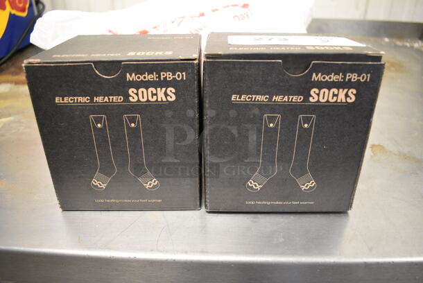 2 BRAND NEW IN BOX! Model PB-01 Electric Heated Socks. 2 Times Your Bid!