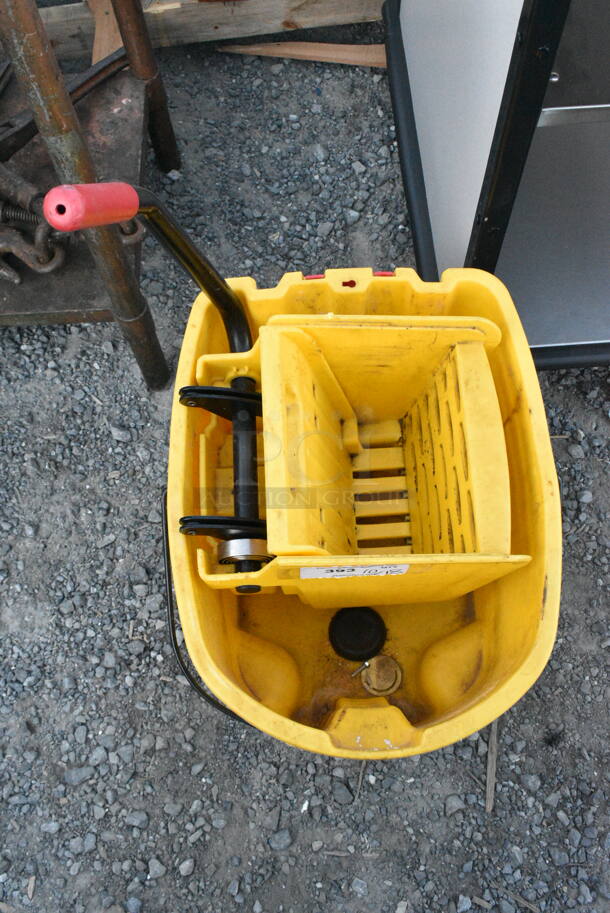 Yellow Poly Mop Bucket w/ Wringing Attachment on Casters.  - Image 3 of 6
