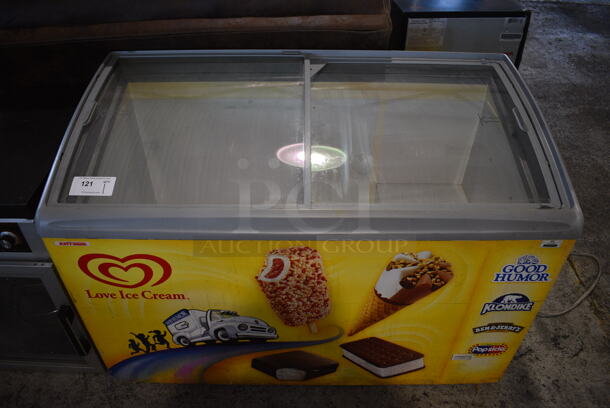 AHT Model RIO S 125 Metal Commercial Novelty Ice Cream Freezer Merchandiser. Comes w/ 4 Commercial Casters. 120 Volts, 1 Phase. 48x26x33. Tested and Powers On But Does Not Get Cold