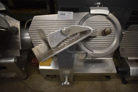 Fleetwood 412 E Stainless Steel Commercial Countertop Meat Slicer w/ Blade Sharpener. 115 Volts, 1 Phase. 25x24x21. Tested and Does Not Power On