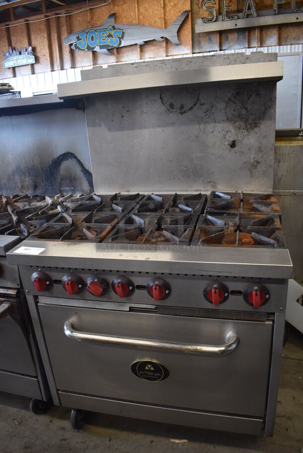 Atena Stainless Steel Commercial Natural Gas Powered 6 Burner Range w/ Oven, Over Shelf and Back Splash on Commercial Casters. 