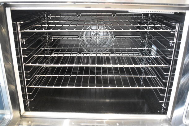 BRAND NEW SCRATCH AND DENT! Cooking Performance Group CPG 351FEC100E Stainless Steel Commercial Electric Powered Full Size Convection Oven w/ View Through Doors, Metal Oven Racks and Thermostatic Controls. 220-240 Volts, 3 Phase.  - Image 4 of 6