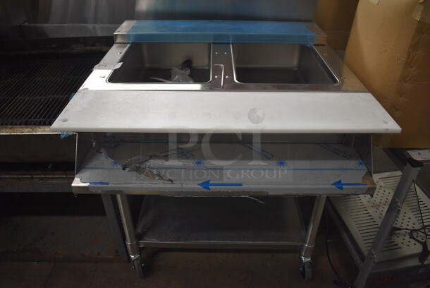 BRAND NEW SCRATCH AND DENT! Eagle SPHT2-120 Stainless Steel Commercial Electric Powered 2 Well Steam Table w. Under Shelf. 120 Volts, 1 Phase. 33x24x36. Tested and Working!
