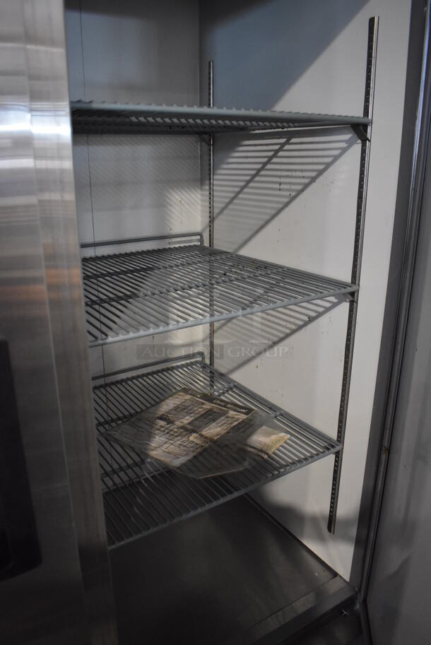 EXCELLENT CONDITION! Avantco 178A49RHC Stainless Steel Commercial 2 Door Reach In Cooler w/ Poly Coated Racks on Commercial Casters. 115 Volts, 1 Phase. 54x33x82.5. Tested and Working! - Image 7 of 8