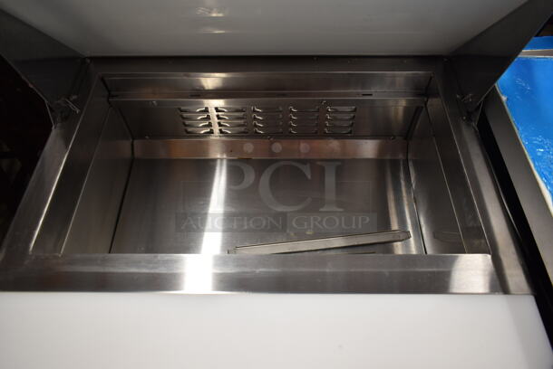 BRAND NEW SCRATCH AND DENT! 2023 Avantco 178APT27HC Stainless Steel Commercial Sandwich Salad Prep Table Bain Marie Mega Top on Commercial Casters. 115 Volts, 1 Phase. Tested and Working! - Image 4 of 8
