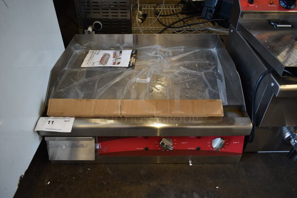 BRAND NEW SCRATCH AND DENT! Avantco 177EG24N Stainless Steel Commercial Countertop Electric Powered Flat Top Griddle. 208/240 Volts, 1 Phase. 