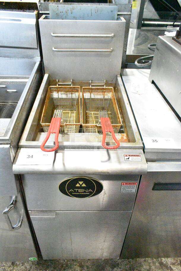 2020 Atena ATF4-N-C-S tainless Steel Commercial Floor Style Natural Gas Powered Deep Fat Fryer w/ 2 Metal Fry Baskets on Commercial Casters. 120,000 BTU.  - Image 1 of 6