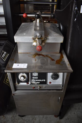 Henny Penny 500 Stainless Steel Commercial Electric Powered Floor Style Pressure Fryer on Commercial Casters. 208 Volts, 3 Phase. 18x38x46