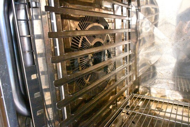 2017 Rational SCC WE 102G Stainless Steel Commercial Natural Gas Powered Self Cooking Center Combi Convection Oven on Equipment Stand w/ Commercial Casters. 170,000 BTU.   - Image 4 of 7