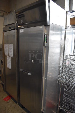 Continental 1RE Stainless Steel Commercial Single Door Reach In Cooler w/ Poly Coated Racks on Commercial Casters. 115 Volts, 1 Phase. 29x34x83. Tested and Working!