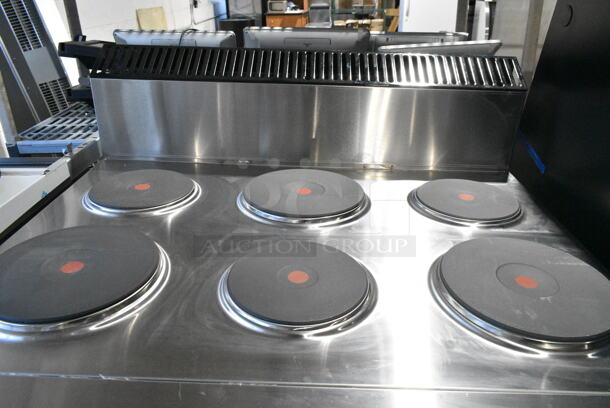 BRAND NEW SCRATCH AND DENT! 2024 Garland SS686 Stainless Steel Commercial Floor Style Electric Powered 6 French Burner Range w/ Oven. 208 Volts, 1/3 Phase.  - Image 4 of 10