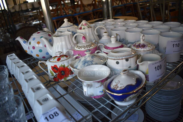 15 Various White Ceramic Items; Sugar Holder, Pitcher, Mugs and Tea Pot. Includes 10.5x5.5x7. 15 Times Your Bid! - Image 2 of 4