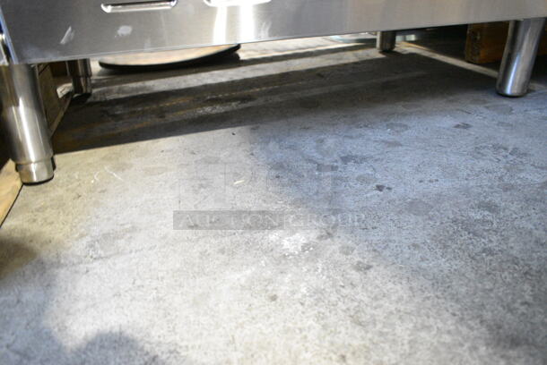 BRAND NEW SCRATCH AND DENT! 2024 Garland SS686 Stainless Steel Commercial Floor Style Electric Powered 6 French Burner Range w/ Oven. 208 Volts, 1/3 Phase.  - Image 9 of 10