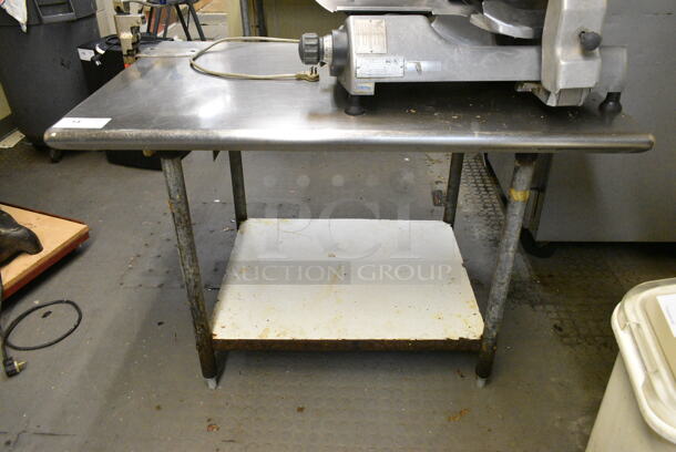 Stainless Steel Table w/ Metal Under Shelf and Mounted Commercial Can Opener. (kitchen) - Image 1 of 3