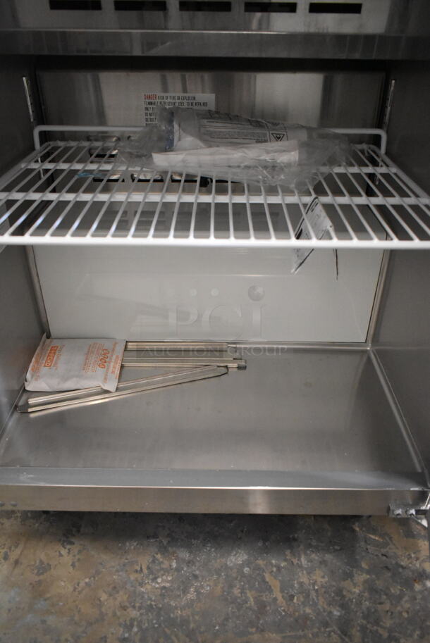 BRAND NEW SCRATCH AND DENT! 2024 Avantco 178APT27HC Stainless Steel Commercial Sandwich Salad Prep Table Bain Marie Mega Top on Commercial Casters. 115 Volts, 1 Phase. Tested and Working! - Image 6 of 7