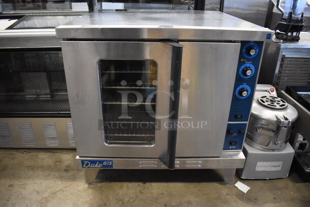 Duke 611-32V Stainless Steel Commercial Electric Powered Full Size Convection Oven w/ View Through Door, Solid Door, Metal Oven Racks and Thermostatic Controls. 38x42x39.5 - Image 1 of 8