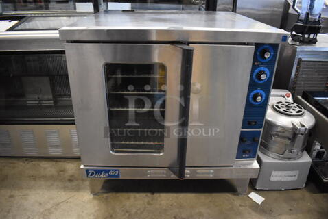 Duke 611-32V Stainless Steel Commercial Electric Powered Full Size Convection Oven w/ View Through Door, Solid Door, Metal Oven Racks and Thermostatic Controls. 38x42x39.5