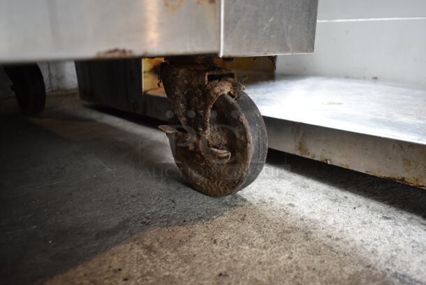 Imperial IR-6 Stainless Steel Commercial Natural Gas Powered 6 Burner Range w/ Oven and Back Splash on Commercial Casters.  - Image 5 of 7