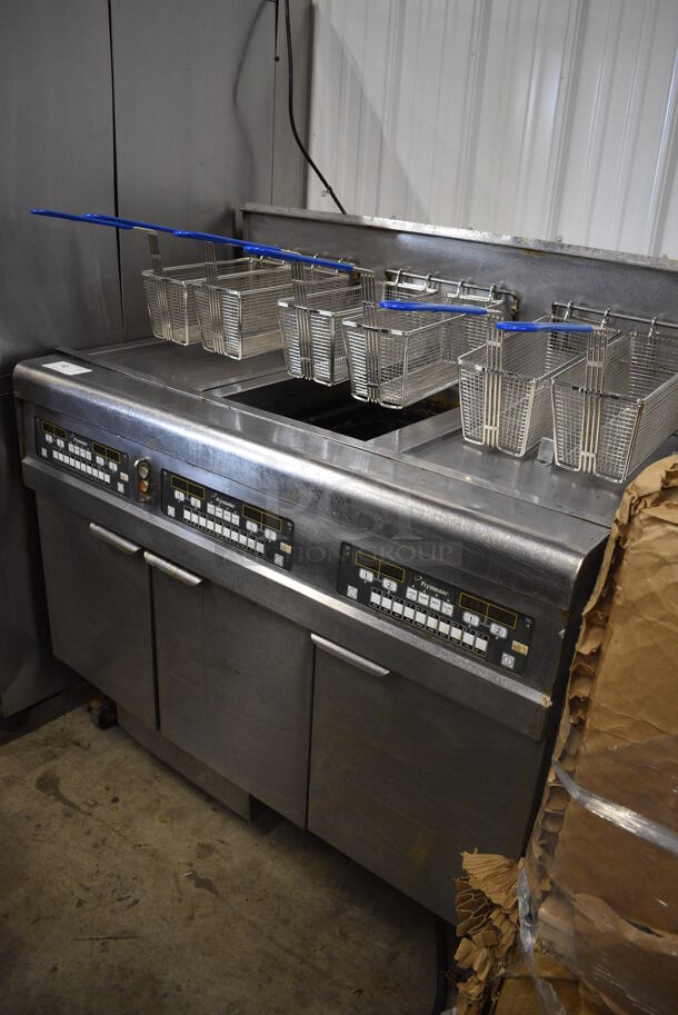2010 Frymaster Model BIGLA330CSD Stainless Steel Commercial Floor Style Natural Gas Powered 3 Bay Deep Fat Fryer w/ 6 NEW Metal Fry Baskets and 2 Lids on Commercial Casters. 75,000 BTU. 48x33x48.5 - Image 2 of 11