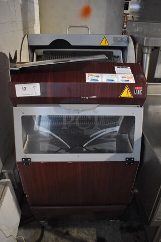 JAC Metal Commercial Floor Style Bread Loaf Slicer on Commercial Casters. 115 Volts, 1 Phase. 23.5x24x53. Tested and Working!