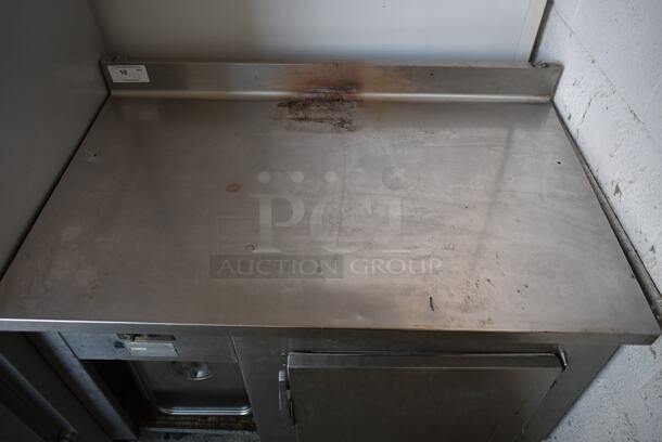 Stainless Steel Commercial Single Door Work Top Cooler w/ Backsplash on Commercial Casters. Tested and Powers On But Does Not Get Cold - Image 2 of 10