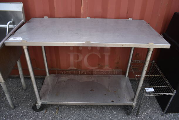 Stainless Steel Table w/ Stainless Steel Under Shelf on Commercial Casters. 48x24x36.5