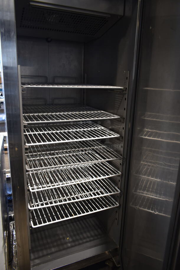 Coldline M28F Stainless Steel Commercial Single Door Reach In Freezer w/ Poly Coated Racks on Commercial Casters. 115 Volts, 1 Phase. Tested and Powers On But Does Not Get Cold - Image 5 of 6