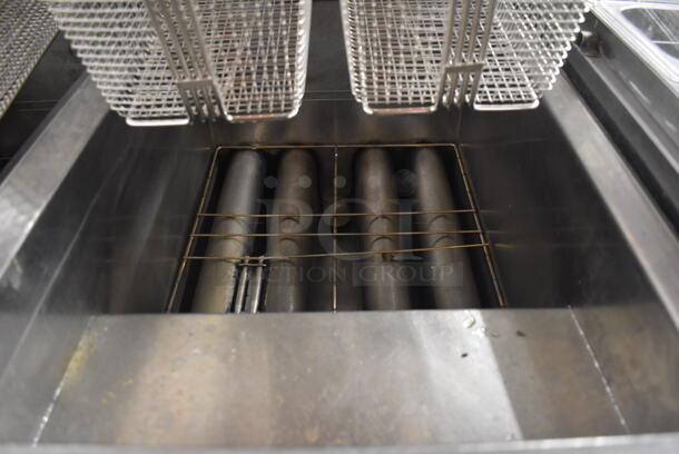 2011 Dean SCFSM350GNS Stainless Steel Commercial Floor Style Natural Gas Powered 3 Bay Deep Fat Fryer w/ 6 Metal Fry Baskets and Filtration System on Commercial Casters. 105,600 BTU. 47x30x51 - Image 4 of 11