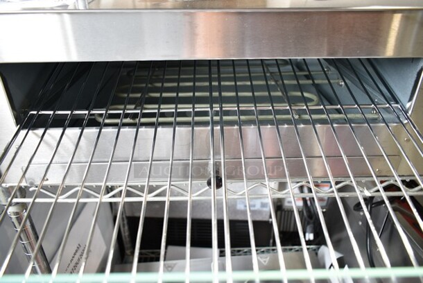 BRAND NEW SCRATCH AND DENT! Avantco CPO16TSGL Stainless Steel Countertop Pizza / Snack Oven with Adjustable Thermostatic Control and Glass Door. 120 Volts, 1 Phase. Tested and Working! - Image 3 of 4