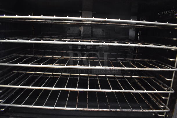 2 Vulcan Stainless Steel Commercial Natural Gas Powered Full Size Convection Oven w/ View Through Doors, Metal Oven Racks and Thermostatic Controls on Commercial Casters. 40x34x70. 2 Times Your Bid! - Image 5 of 7